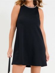 Sukienka mini z dekoracyjnym dekoltem - czarny. Czarne sukienki damskie Sinsay, l, bez wzorów, bez kołnierzyka, bez ramiączek, mini. W wyprzedaży za 29.99 zł.