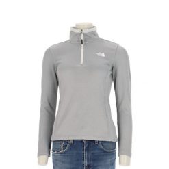 Second life - Bluza polarowa damska The North Face szara - Stan bardzo dobry. Szare bluzy damskie The North Face, l, bez wzorów, z materiału, bez kaptura. Za 127.76 zł.