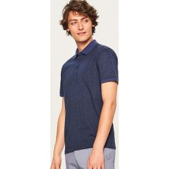 Koszulka polo z nadrukiem - Granatowy. Niebieskie koszulki polo męskie Reserved, z nadrukiem. Za 59.99 zł.