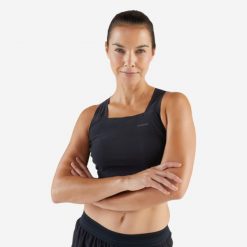 Koszulka do biegania bez rękawów damska Kiprun 900 Light crop top. Czarne koszulki sportowe damskie KIPRUN, l, bez wzorów, z elastanu, bez kołnierzyka, bez ramiączek, do biegania. W wyprzedaży za 89.99 zł.