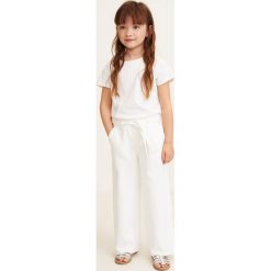 Mango Kids - Spodnie dziecięce Irish 104-164 cm. Jeansy dla dziewczynek marki Mango Kids. Za 89.90 zł.