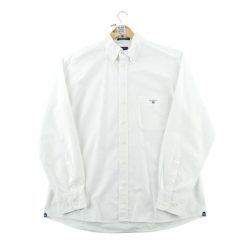 Klasyczna męska jednolita biała koszula. Białe koszule męskie GANT, m, bez wzorów, klasyczne, bez kołnierzyka, bez ramiączek. Za 106.46 zł.