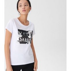 T-shirt z cekinami - Biały. T-shirty damskie marki DOMYOS. W wyprzedaży za 19.99 zł.