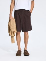Szorty loose fit z lyocellem - ciemnobrązowy. Brązowe szorty męskie Reserved, l, bez wzorów, z bawełny. Za 139.99 zł.
