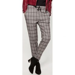 Spodnie Jogger fit - Szary. Spodnie materiałowe damskie marki Mohito. W wyprzedaży za 59.99 zł.