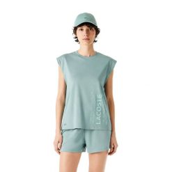 Koszulka damska Lacoste. Zielone koszulki sportowe damskie Lacoste, xs, z aplikacjami, z bawełny, bez kołnierzyka, bez ramiączek, na fitness i siłownię. Za 167.00 zł.