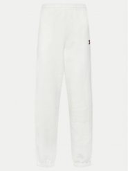 Tommy Jeans Spodnie dresowe Badge DW0DW20679 Écru Regular Fit. Jeansy damskie Tommy Jeans, s, bez wzorów, z bawełny. Za 219.99 zł.