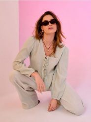 Muślinowe spodnie wide leg - zielony. Zielone spodnie materiałowe damskie Sinsay, l, bez wzorów. Za 49.99 zł.