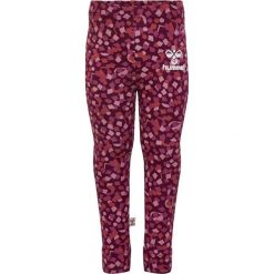 Legginsy dla dziewczynki Hummel Confetti. Czerwone legginsy dla dziewczynek Hummel, bez wzorów. Za 191.00 zł.