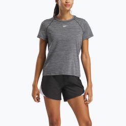 Koszulka Reebok Id Train Tee. Czarne koszulki sportowe damskie REEBOK FITNESS, bez wzorów, sportowe, bez kołnierzyka. Za 79.99 zł.