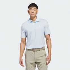 Koszulka polo Ultimate365 Solid. Niebieskie buty sportowe męskie Adidas, m, bez wzorów, z materiału, sportowe, bez ramiączek. Za 259.00 zł.