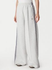 Adidas Spodnie dresowe Spacer HY8044 Szary jasny Wide Leg. Szare spodnie dresowe damskie Adidas, m, bez wzorów, z dresówki. Za 222.99 zł.