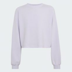 BLUZA ADIDAS DLA DZIEWCZĄT. Czarne bluzy dla dziewczynek Adidas, bez wzorów, z elastanu, bez ramiączek, bez kaptura. Za 179.00 zł.