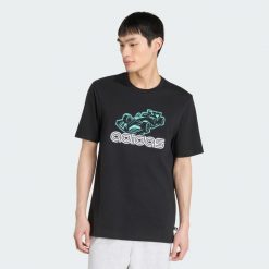KOSZULKA MOTORSPORT GRAPHIC. Czarne koszulki sportowe męskie Adidas, l, bez wzorów, z bawełny, bez kołnierzyka, bez ramiączek. Za 145.50 zł.