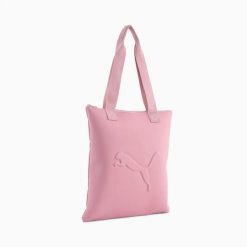 Torba damska Puma BUZZ TOTE różowa 09115710. Czerwone torebki shopper damskie Puma, bez wzorów, biznesowe, bez dodatków. Za 64.35 zł.