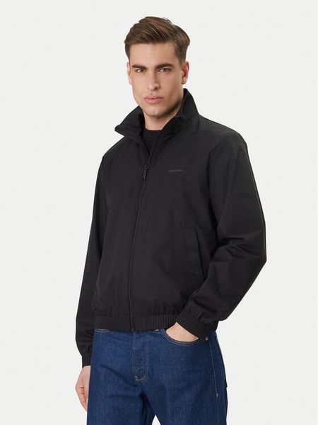 Calvin Klein Wiatrówka LV04LF515G Czarny Regular Fit. Czarne kurtki męskie Calvin Klein, m, bez wzorów, z syntetyku, bez kaptura. Za 471.99 zł.