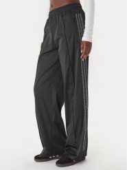 Adidas Spodnie dresowe Pearl Firebird KC7863 Czarny Loose Fit. Czarne spodnie dresowe damskie Adidas, l, bez wzorów, z dresówki. Za 349.99 zł.