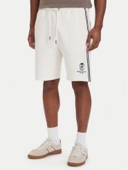 Tommy Hilfiger Szorty sportowe Crest Embroidery MW0MW42878 Beżowy jasny Relaxed Fit. Brązowe krótkie spodenki sportowe męskie Tommy Hilfiger, l, bez wzorów, z bawełny. Za 489.99 zł.