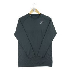 Second life - T-shirt męski Gymshark na siłownię czarny - Jak nowy. Czarne t-shirty męskie GYMSHARK, l, bez wzorów, z materiału, eleganckie, bez kołnierzyka. Za 106.46 zł.
