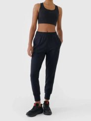Spodnie treningowe z wykończeniem szybkoschnącym damskie 4F Czarny XS. Czarne spodnie sportowe damskie Under Armour, xs, bez wzorów, z elastanu. Za 179.99 zł.