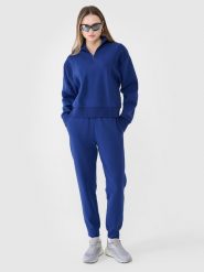 4F Spodnie dresowe joggery damskie - granatowe XS. Niebieskie spodnie dresowe damskie 4f, l, bez wzorów, z bawełny. W wyprzedaży za 119.99 zł.