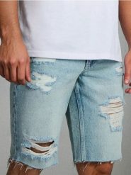 Szorty jeansowe z ozdobnymi rozcięciami - zielony. Zielone szorty męskie Sinsay, m, bez wzorów, z jeansu. Za 59.99 zł.