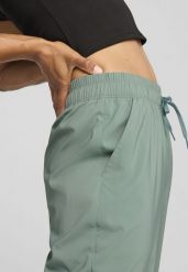 Damskie spodnie LACE PUMA Green Moon. Zielone spodnie sportowe damskie Puma, l, bez wzorów, z tkaniny, na fitness i siłownię. Za 241.05 zł.