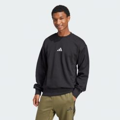 Bluza polarowa Essentials Feelcozy. Białe bluzy męskie Adidas, xs, bez wzorów, z materiału, bez kaptura. Za 179.00 zł.