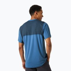 Koszulka trekkingowa męska Helly Hansen Tech Trail. Niebieskie koszulki sportowe męskie Helly Hansen, m, bez wzorów, bez kołnierzyka, bez ramiączek, trekkingowe. Za 129.99 zł.