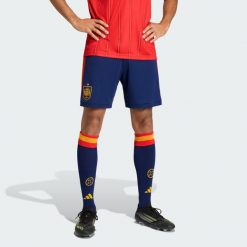 Szorty Spain 26 Home. Niebieskie krótkie spodenki sportowe męskie Adidas, bez wzorów, do piłki nożnej, climacool (adidas). Za 199.00 zł.