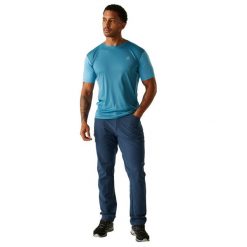 Męskie Spodnie Z Odpinanymi Nogawkami Tuned In II. Niebieskie spodnie sportowe męskie Dare 2b, m, bez wzorów, z elastanu, rowerowe. Za 142.99 zł.