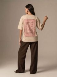 Bawełniana koszulka z nadrukiem kwiatowym - beżowy. Brązowe t-shirty damskie Sinsay, l, bez wzorów, z bawełny, bez kołnierzyka. Za 25.99 zł.