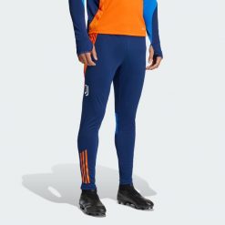 Spodnie Juventus Tiro 24 Competition Training. Niebieskie spodnie sportowe męskie Adidas, xs, bez wzorów, z dresówki, do piłki nożnej. W wyprzedaży za 209.30 zł.
