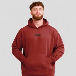 Bluza męska z kapturem oversize czerwona Unstoppable. Czerwone bluzy sportowe męskie GYMBEAM, m, bez wzorów, z bawełny, z kapturem, na fitness i siłownię. Za 118.90 zł.