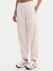 Reebok Spodnie dresowe Galina RK25518CCW Różowy Relaxed Fit. Czerwone spodnie dresowe damskie Reebok, xs, bez wzorów, z dresówki. Za 219.99 zł.