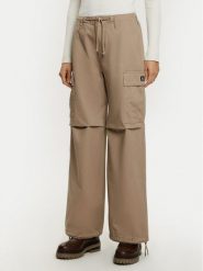 Converse Spodnie materiałowe 10026957-A03 Beżowy Relaxed Fit. Brązowe spodnie materiałowe damskie Converse, xs, bez wzorów, z bawełny. Za 219.99 zł.