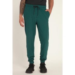 Męskie Spodnie dresowe FLEXNAMIC® materiał szybkoschnący do fitnessu. Zielone krótkie spodenki sportowe męskie JAY-PI, m, bez wzorów, z dresówki, na fitness i siłownię. Za 294.99 zł.