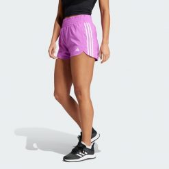 Szorty Pacer Training 3-Stripes Woven High-Rise. Białe obuwie sportowe damskie Adidas, xs, bez wzorów, z materiału, sportowe, na fitness i siłownię. Za 124.99 zł.