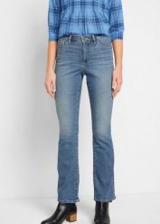 Jeansy o kroju bootcut ze średnim stanem, z bawełny organicznej. Niebieskie jeansy damskie bonprix. Za 149.99 zł.