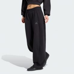Polarowe spodnie Essentials Contemporary typu barrel. Czarne spodnie materiałowe damskie Adidas, xs, bez wzorów, z bawełny. Za 239.00 zł.