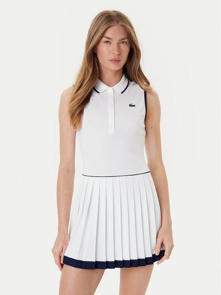 Lacoste Sukienka tenisowa EF8582 Biały Slim Fit. Białe koszulki sportowe damskie Lacoste, bez wzorów, z syntetyku, sportowe, bez kołnierzyka, bez ramiączek, sportowe. Za 469.99 zł.