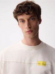 T-shirt relaxed fit - złamana biel. T-shirty męskie Reserved, l, bez wzorów, z bawełny, bez kołnierzyka. Za 79.99 zł.