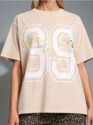 Koszulka z krótkim rękawem - beżowy. Brązowe t-shirty damskie Sinsay, l, bez wzorów, bez kołnierzyka. W wyprzedaży za 7.99 zł.