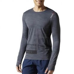 Koszulka treningowa męska Reebok AX9512. Szare koszulki sportowe męskie Reebok, l, bez wzorów, z materiału, bez kołnierzyka, bez ramiączek, do biegania. Za 219.99 zł.