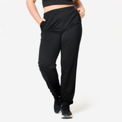 Spodnie fitness damskie Domyos. Czarne spodnie dresowe damskie DOMYOS, s, bez wzorów, z dresówki. Za 49.99 zł.