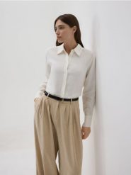 Spodnie balloon z paskiem - beżowy. Brązowe spodnie materiałowe damskie Reserved, l, bez wzorów, z tkaniny. Za 149.99 zł.