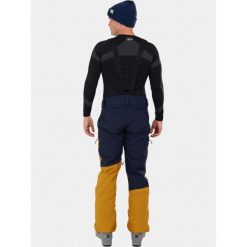 Spodnie Narciarskie Męskie Fundango Teak Colourblock. Niebieskie spodnie snowboardowe męskie Fundango, m, bez wzorów, z materiału, narciarskie. Za 599.90 zł.