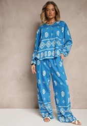 Niebieski Komplet w Stylu Etno Spodnie z Gumką w Pasie i Bluzka Oversize Eviralyn. Niebieskie bluzki damskie Renee, bez wzorów, eleganckie, bez kołnierzyka, bez ramiączek. Za 89.99 zł.