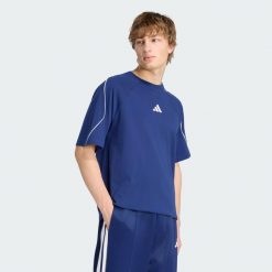 Koszulka Stadium. Niebieskie koszulki sportowe męskie Adidas, xl, bez wzorów, z bawełny, bez kołnierzyka, bez ramiączek. Za 179.00 zł.