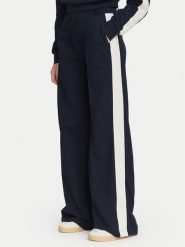 Guess Spodnie materiałowe V6YB26 K5139 Granatowy Relaxed Fit. Niebieskie spodnie dresowe damskie Guess, xxs, z aplikacjami, z materiału. Za 434.99 zł.